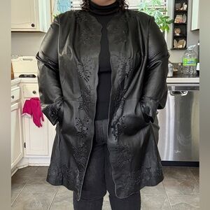 Elegant Black Leather Jacket with Floral Accents